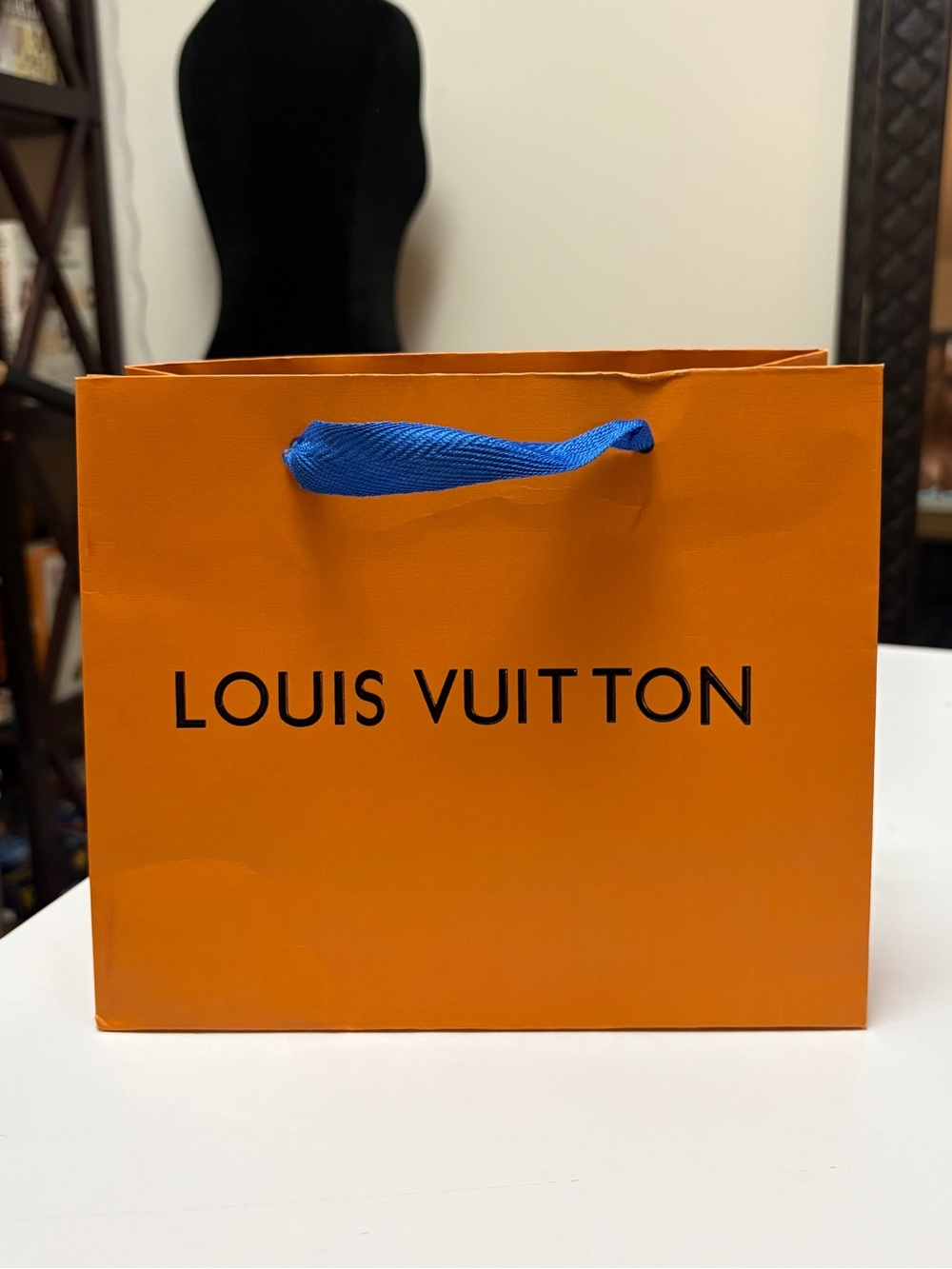 Small Louis Vuitton gift bag.